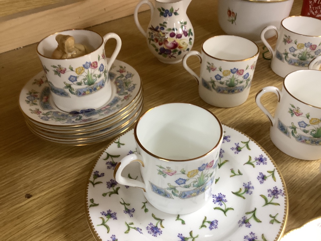 A Worcester porcelain candle extinguisher and a Mayfield pattern coffee set